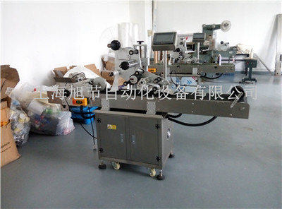 全自动轻薄物体分页贴标机 环保在线包装辅助设备的智能革新